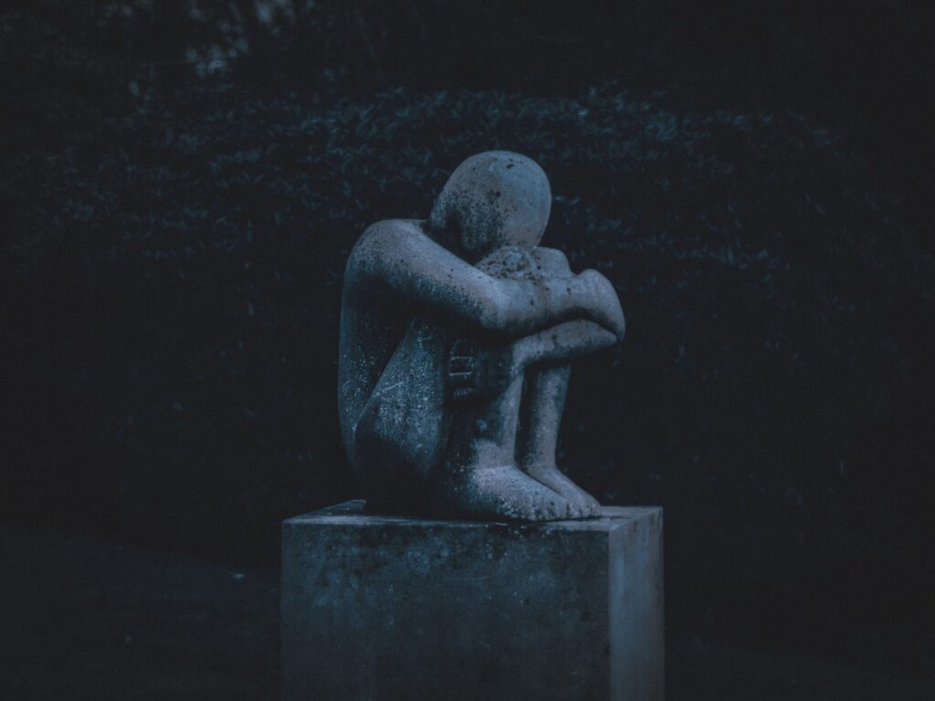 Depression taglines and stories 2 A sad statue